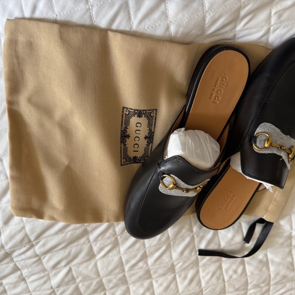Gucci Black Leather Mules with Gold Accents